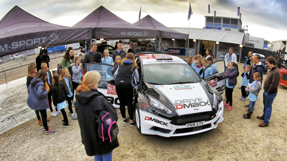 Vistitors viewing cars at the World Rally Championship